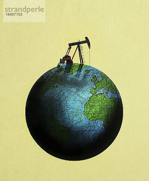 Ölbohrturm auf der Weltkugel