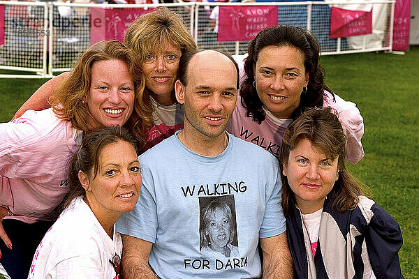 Portrait of a group of breast cancer walkers.