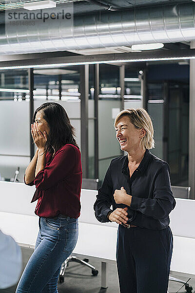 Happy businesswomen having fun in office