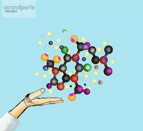 Moleküle schweben über der offenen Hand