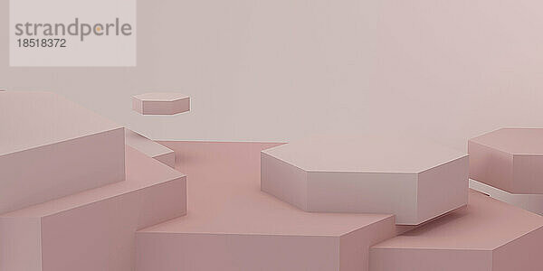 Geometrisch geformtes Podium vor rosa Hintergrund