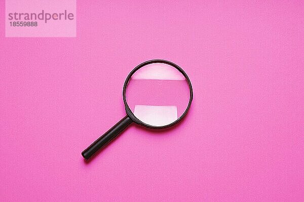 Lupe Lupe Lupe Suchsymbol auf rosa Hintergrund mit Kopie Raum