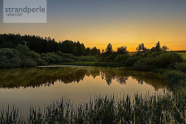 Teich mit Sonnenuntergang im Harz