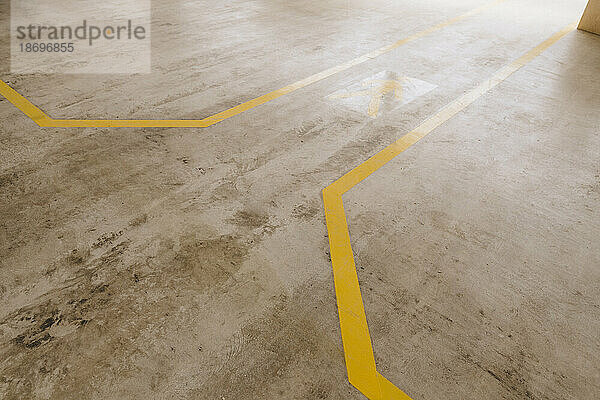 Yellow marking on floor of carpentry factory