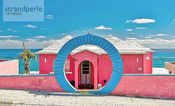 Colourful Bermuda home with traditional Moon Gate in front  Bermuda  Atlantic  North America