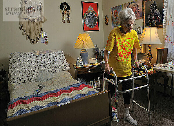 Portrait of older woman with a walker  inside her apartment in Easton  PA.
