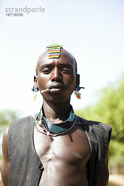 A portrait of a local man in the Sami village in the remote Omo Valley of Ethiopia.