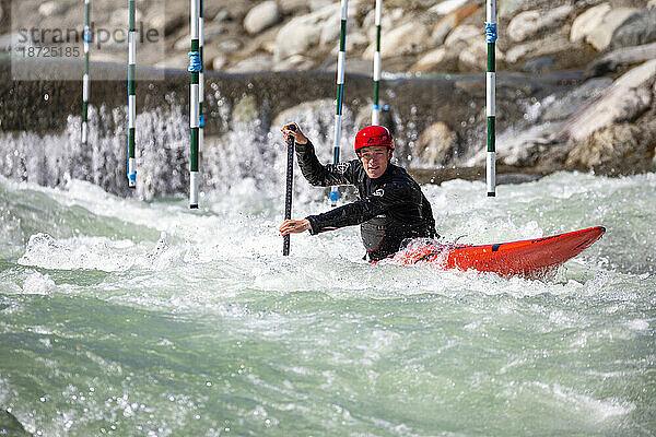 Olympic hopeful kayaker trains at the Rutherford Whitewater Park.
