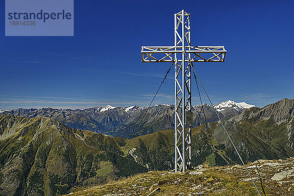Summit cross on mountain in Hohe Tauern National Park  Austria