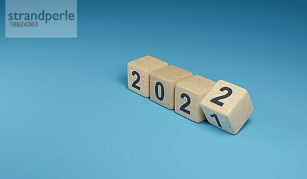 Flipping Holzwürfel mit der Jahreszahl 2021 und 2022  Neujahrskonzept  3d Rendering