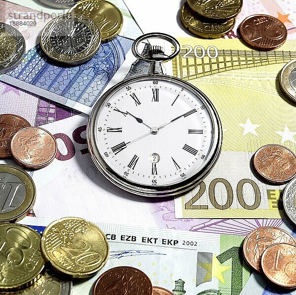 Euro mit Uhr  Symbolfoto für Zeit ist Geld