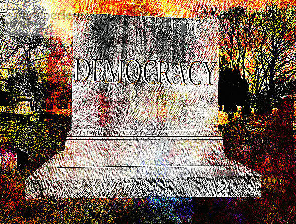 Das Wort 'Democracy' auf einem Grabstein