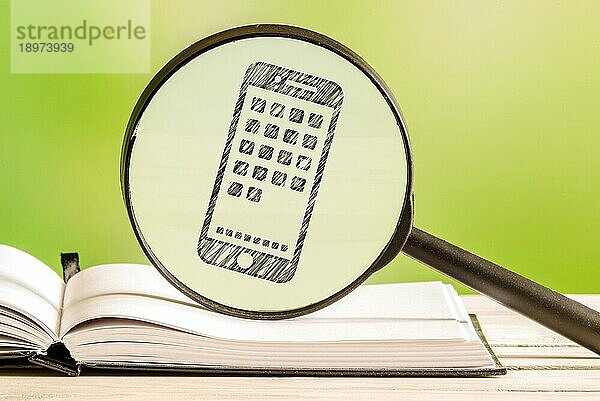Smartphone Suche mit einer Bleistiftzeichnung eines Telefons in einem Vergrößerungsglas