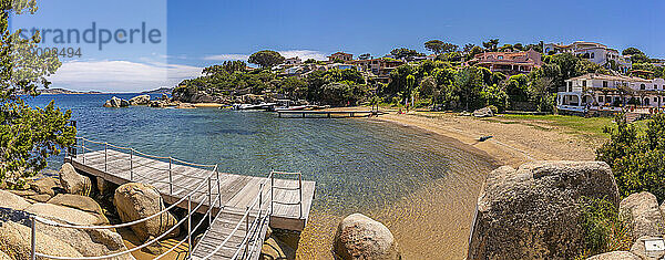 View of beach and whitewashed villas of Porto Rafael  Sardinia  Italy  Mediterranean  Europe