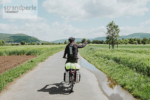 A cyclist watching the landscapes of Romantische StraÃ?e route