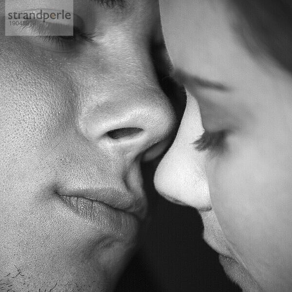 Couple kissing  close up.