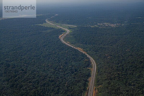 Empty highway in the jungle  future capital Ciudad de la Paz  Rio Muni  Equatorial Guinea  Africa