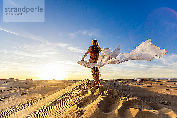 Ethereal woman at the Imperial Sand Dunes  California  United States of America  North America