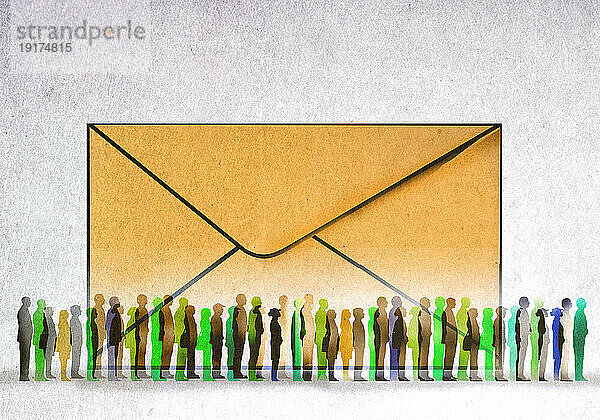 People waiting in line in front of oversized envelope