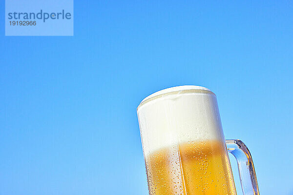 Beer glass and blue sky