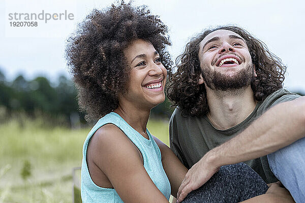 Laughing couple outdoors