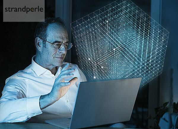 Digitales zusammengesetztes Bild eines Geschäftsmannes mit Laptop und 3D-Würfel im Büro