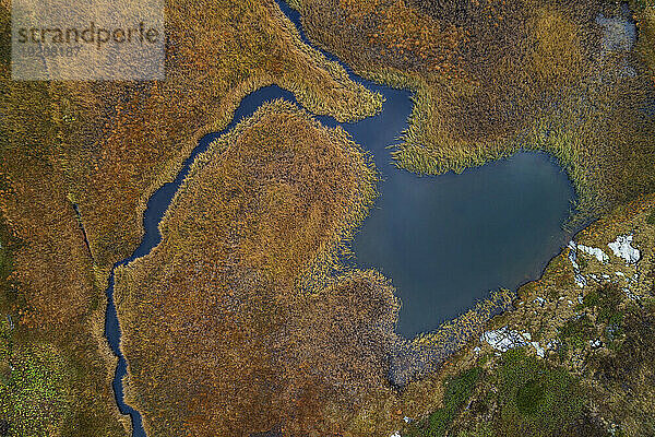 Switzerland  Graubunden Canton  Aerial view of small alpine lake in San Bernardino Pass area