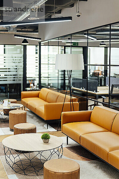 Coffee tables and furniture at modern workplace