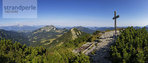 Austria  Salzburger Land  Drone panorama of summit cross on Gruberhorn mountain