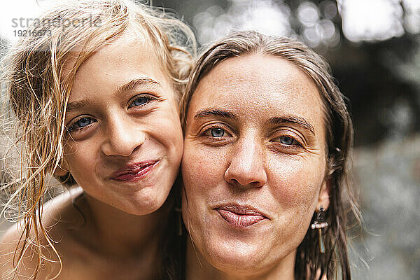 Smiling mother with blond son