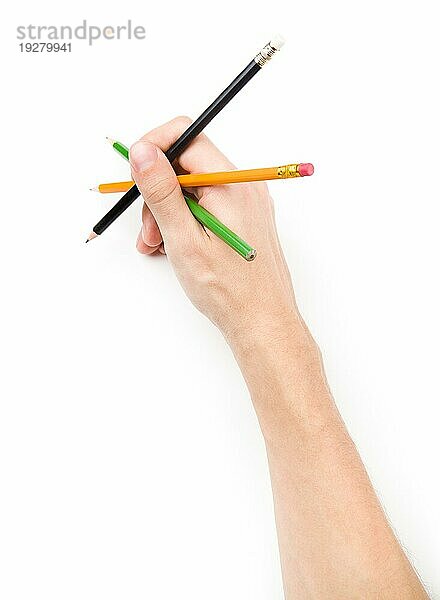 Mit drei Bleistiften zu schreiben versuchen