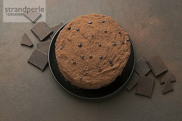 Draufsicht Schokoladenkuchen mit Kakaopulver
