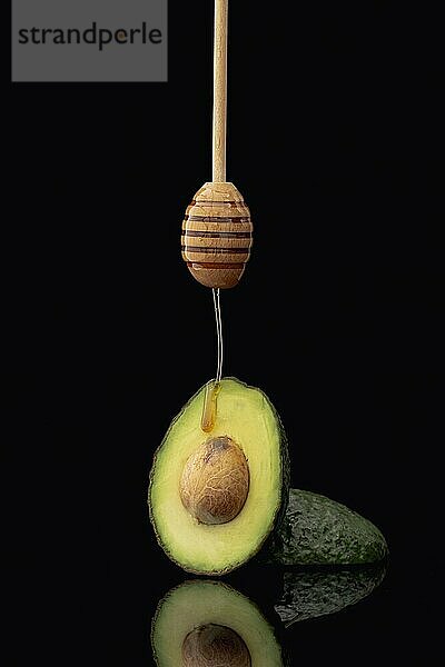 Vorderansicht Avocado Honig Dipper