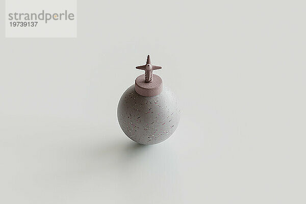 3D-Darstellung einer rosa Bombe auf weißem Hintergrund