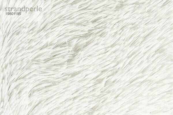 Flauschiges Plaid aus Polyester mit einem langen Haufen grau. Gemütliche Heimtextilien. Hintergrund  Textur
