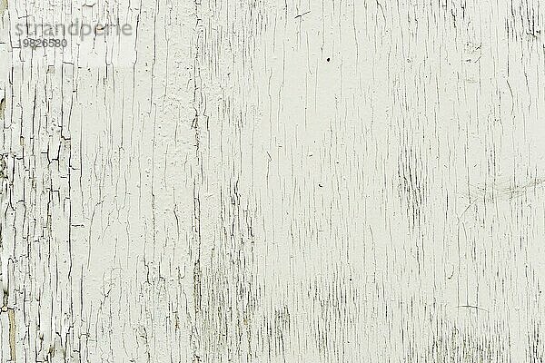 Strukturierter Hintergrund Holzoberfläche mit Wasser Emulsionsfarbe mit kleinen Rissen in der Zeit gemalt. Rustikaler Hintergrund