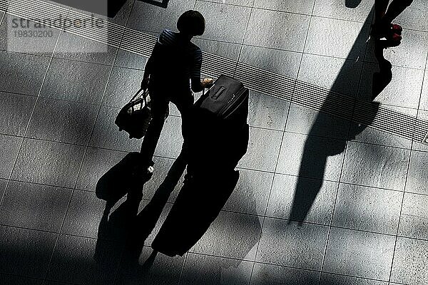 People with suitcases walking at Berlin Central Station. Berlin  07.09.2023