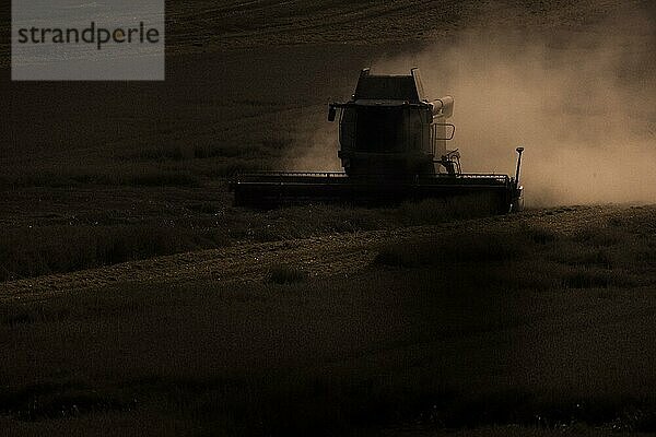 A combine harvester in a field  photographed near Friedersdorf  18/08/2023