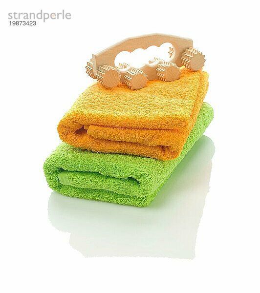 Massagegerät auf Handtüchern
