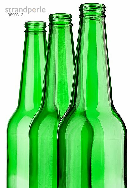 Spitze von drei grünen Flaschen isoliert