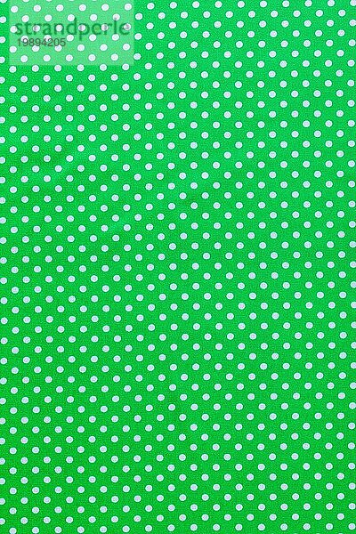 Grüner gepunkteter Baumwolldruck  Ansicht von oben