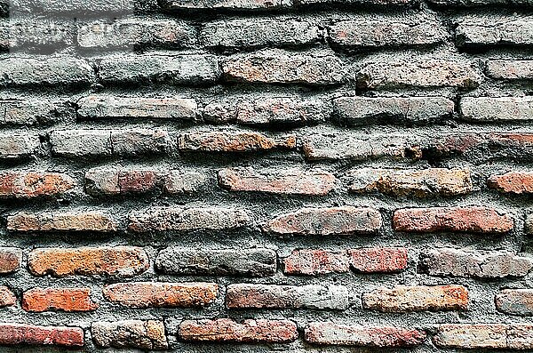 Pattern Hintergrund der alten antiken rauen Vintage Backsteinmauer close up