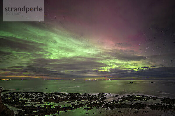 UK  Scotland  Dunbar  Long exposure of Aurora Borealis over Firth of Forth at night