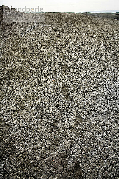 Hiker's footprints in the Bisti Badlands Wilderness in northwestern New Mexico.