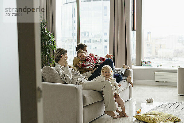 Family spending leisure time together at home