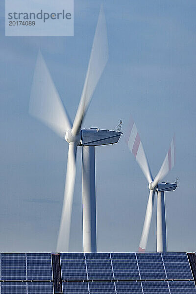 Solar panels and spinning wind turbines