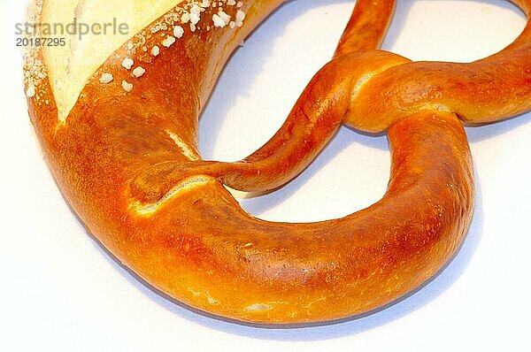 Fresh Bavarian pretzels on white background