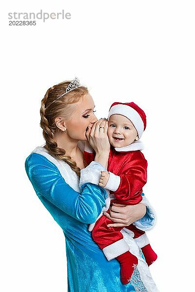Schöne Weihnachten Mädchen sprechen ein Geheimnis zu glücklich Baby Weihnachtsmann Lächeln
