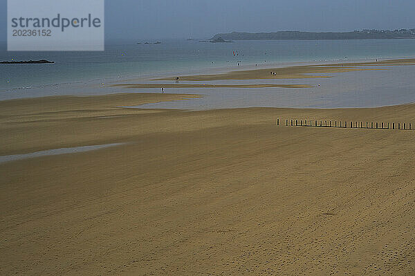 Empty beach on an overcast day in Normandie