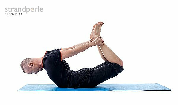Bild der flexiblen Yogi posiert in schwierigen Asana  vor weißem Hintergrund